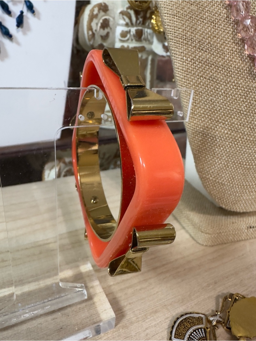 Ted Baker Coral Resin Bangle with Gold Bow Accents